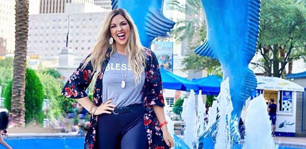 A fun woman on a day out at the Downtown Aquarium