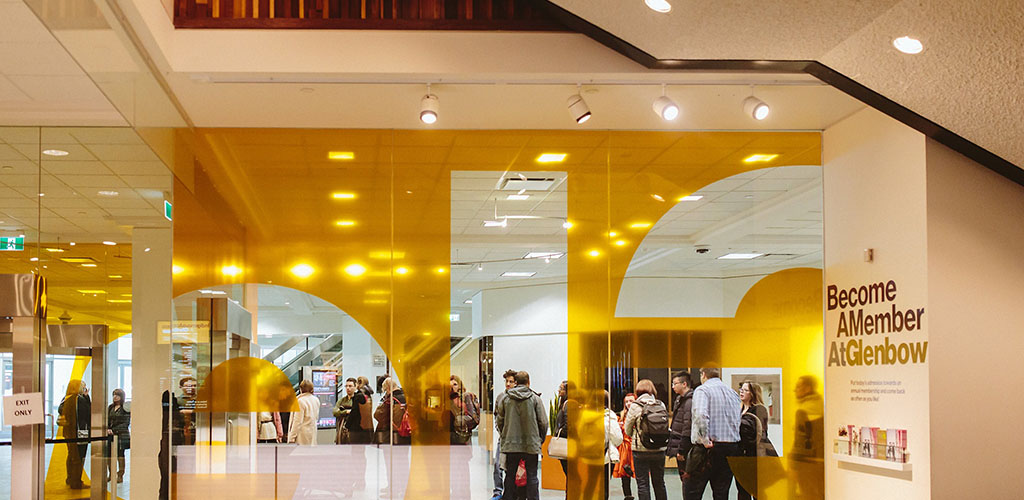 People enjoying the exhibit at Glenbow Museum
