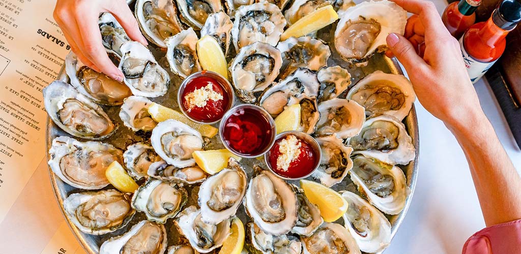 A platter of fresh oysters from Jax Fish House and Oyster Bar