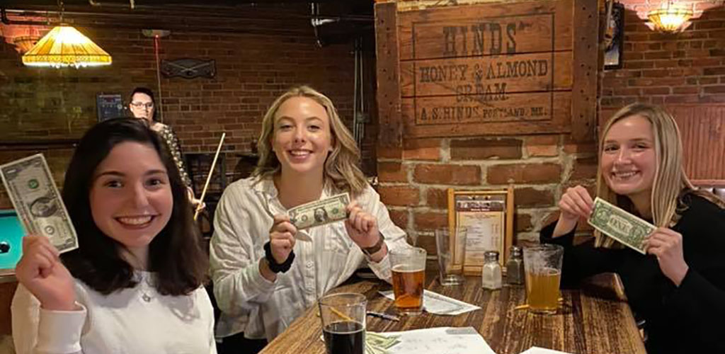 Attractive women dining at Mainely Brews