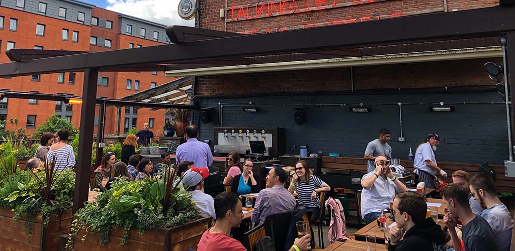 Sheffield singles hanging out outside The Riverside pub