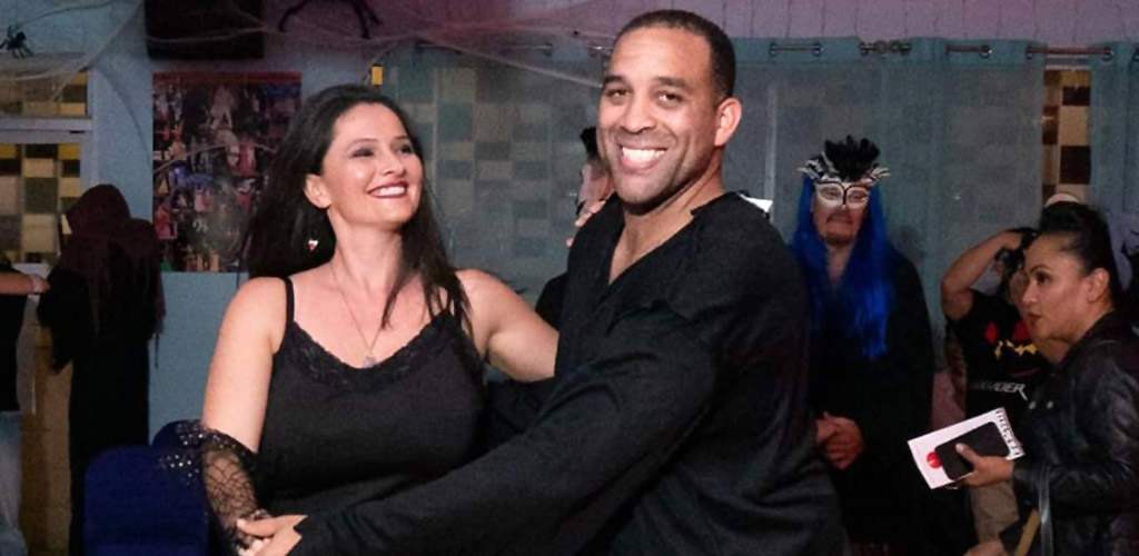 A couple at a dance class in School of Salsa