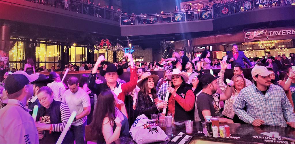 Ladies in the dance floor of Arlington Backyard