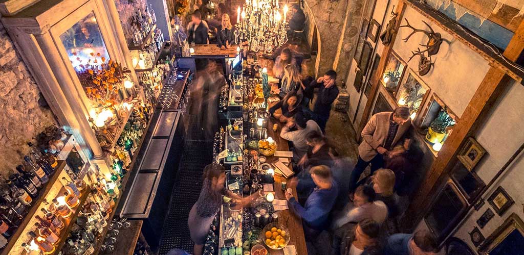 Cougars in Texas drinking with friends at Whisler's