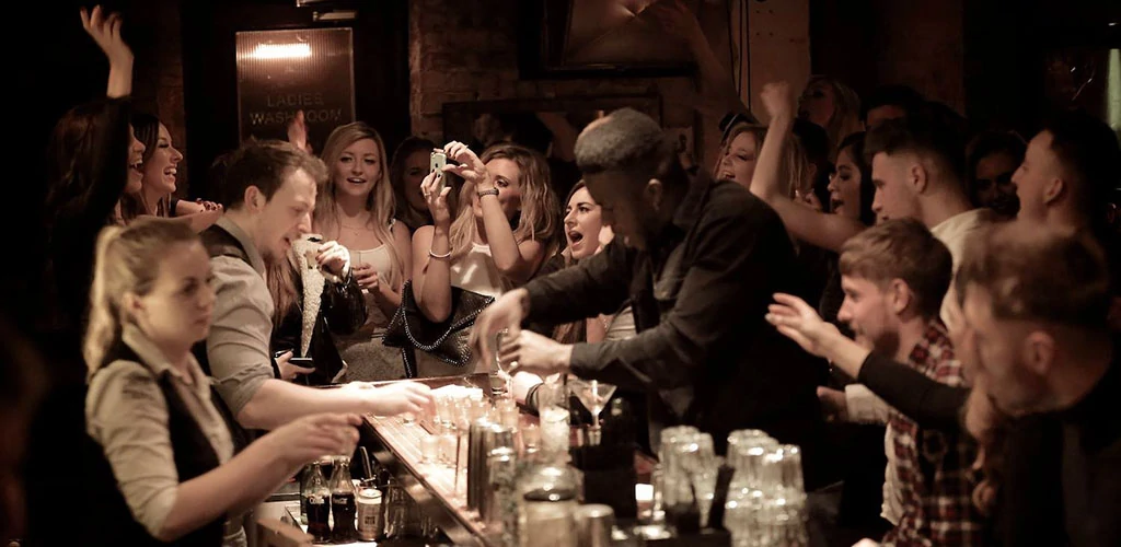 Nottingham singles drinking shots at the bar in Coco Tang