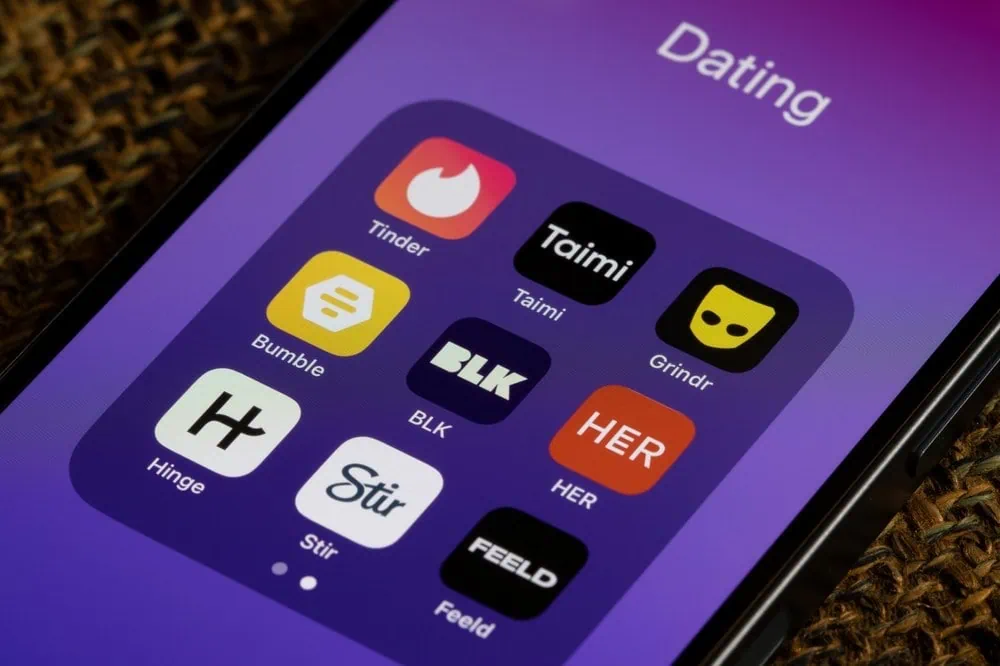 Closeup of a smartphone representing choosing between dating platforms