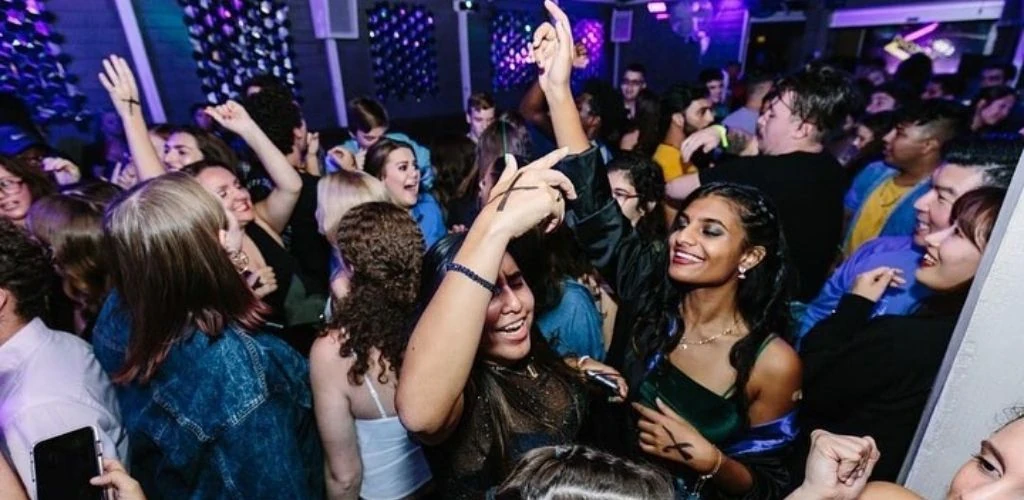 Cougars in Washington DC dancing on the stage of Ultra Bar