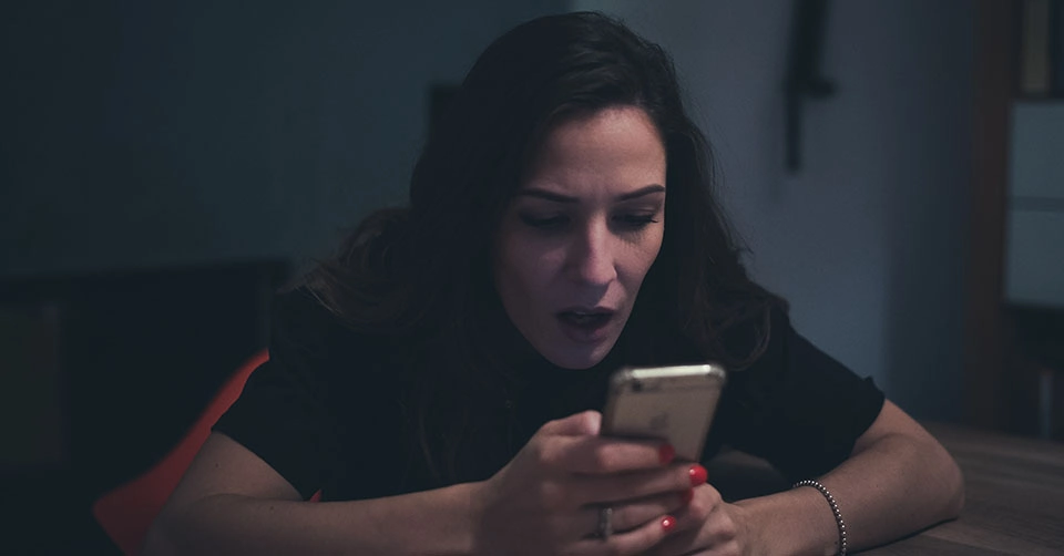 Woman frustrated with a free dating app